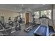 Onsite fitness center features an elliptical, treadmill, and recumbent bicycle for residents at 7625 E Camelback Rd # 310B, Scottsdale, AZ 85251