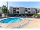 Outdoor pool area with lounge chairs providing a relaxing space for residents and guests at 7625 E Camelback Rd # A139, Scottsdale, AZ 85251