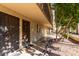 Outdoor walkway featuring a secure gated front entrance, beautiful landscape, and neutral color scheme at 7625 E Camelback Rd # A139, Scottsdale, AZ 85251