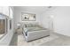 Stylish bedroom with a neutral color palette, plush bedding, and an accent rug creating a serene ambiance at 7638 W Park St, Laveen, AZ 85339