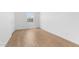 Bedroom with light tile floor, bright window, and white walls at 7638 W Park St, Laveen, AZ 85339