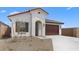 Inviting single-story home with a tile roof, stucco, and a two-car garage in a desirable neighborhood at 7638 W Park St, Laveen, AZ 85339