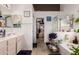 Relaxing bathroom featuring a separate tub and shower, along with a walk-in closet at 8053 E Dover St, Mesa, AZ 85207
