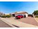 Beautiful single-Gathering home with desert landscaping, three-car garage, and modern exterior at 8053 E Dover St, Mesa, AZ 85207