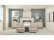 This main bedroom features two chairs, decorative lighting, two nightstands, and neutral colors throughout at 8323 E Petunia Ave, Mesa, AZ 85212