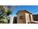 Rustic shed in a backyard, featuring outdoor storage and shelving at 8527 W Jefferson St, Peoria, AZ 85345