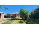 Charming home featuring a covered porch and a well-maintained lawn at 8527 W Jefferson St, Peoria, AZ 85345