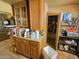 Bright kitchen featuring wood cabinets and additional storage space at 8527 W Jefferson St, Peoria, AZ 85345
