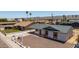 Cozy single-story home features a covered patio and desert landscaping at 927 E Greenway Rd, Phoenix, AZ 85042