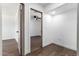 Hallway with hardwood floors leading to bedrooms at 927 E Greenway Rd, Phoenix, AZ 85042