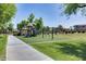 Community playground offers a fun space with slides and swings for to enjoy outdoors at 965 E Virgo Pl, Chandler, AZ 85249