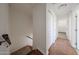 Hallway featuring tile floors and stairs at 10002 N 66Th Ln, Glendale, AZ 85302