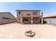 Backyard featuring a fire pit area, perfect for outdoor entertaining at 12426 W Adams St, Avondale, AZ 85323