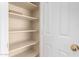 Walk-in pantry featuring spacious shelving and storage at 12426 W Adams St, Avondale, AZ 85323