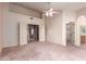 Large main bedroom features vaulted ceilings and three separate entrances to walk-in closets and the main bath at 1258 E Granada St, Mesa, AZ 85203