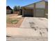 Modest single level home with mature landscaping and a two car garage at 13208 N 51St Ln, Glendale, AZ 85304