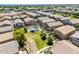 Aerial view of a community park with playground and well-manicured lawns at 1350 S Greenfield Rd # 2205, Mesa, AZ 85206