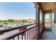 A home's balcony view overlooking community parking and amenities at 1350 S Greenfield Rd # 2205, Mesa, AZ 85206
