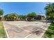 Community basketball court with covered seating area and community homes in the background at 1350 S Greenfield Rd # 2205, Mesa, AZ 85206