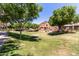 Expansive community greenbelt area offers meticulously maintained landscaping and walking paths at 1350 S Greenfield Rd # 2205, Mesa, AZ 85206