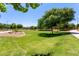 Expansive community greenbelt area offers manicured landscaping and walking paths at 1350 S Greenfield Rd # 2205, Mesa, AZ 85206