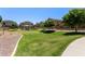 Expansive community greenbelt area offers meticulously maintained landscaping and walking paths at 1350 S Greenfield Rd # 2205, Mesa, AZ 85206