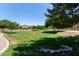 Expansive greenbelt area offers manicured landscaping and walking paths at 1350 S Greenfield Rd # 2205, Mesa, AZ 85206