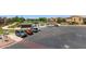 Well-maintained community pool area with ample parking and manicured landscaping at 1350 S Greenfield Rd # 2205, Mesa, AZ 85206