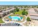 Aerial view of a community pool and common area, ideal for Gathering fun and entertaining at 1350 S Greenfield Rd # 2205, Mesa, AZ 85206