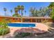 Backyard pool and covered patio. Lush landscaping creates a private, serene setting at 1417 W Rose Ln, Phoenix, AZ 85013