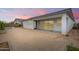 Expansive backyard showcasing a covered patio, custom block planters and privacy fencing at 14177 W Calle Lejos --, Surprise, AZ 85387