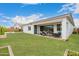 Expansive backyard with lush grass, patio seating, a garden and plenty of room for outdoor enjoyment at 14177 W Calle Lejos --, Surprise, AZ 85387