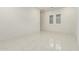 This bedroom provides tile flooring and windows for plenty of natural light at 14177 W Calle Lejos --, Surprise, AZ 85387