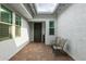 This home has a welcoming courtyard featuring brick flooring and comfortable seating at 14177 W Calle Lejos --, Surprise, AZ 85387