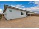Back exterior view of home showcasing the stucco finish, privacy and potential for landscaping at 14177 W Calle Lejos --, Surprise, AZ 85387
