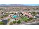 An aerial shot of a neighborhood clubhouse featuring a pool, and recreational amenities at 14725 S 182Nd Dr, Goodyear, AZ 85338