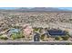 An aerial view shows a community center with a resort-style pool and neighborhood solar panels at 14725 S 182Nd Dr, Goodyear, AZ 85338