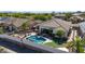 This backyard has a gorgeous pool, desert landscaping and an oversized hot tub at 14725 S 182Nd Dr, Goodyear, AZ 85338