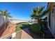 Backyard featuring an inground pool, lush landscaping, an outdoor train feature, and mountain views at 14725 S 182Nd Dr, Goodyear, AZ 85338
