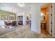 Inviting dining room with an elegant dining set, decorative lighting, and seamless transition to the living area at 14725 S 182Nd Dr, Goodyear, AZ 85338