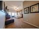 Spacious main bedroom with carpet flooring, ceiling fan, and natural light at 14725 S 182Nd Dr, Goodyear, AZ 85338