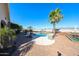 Backyard pool with lush landscaping and mountain views, perfect for relaxation and outdoor enjoyment at 14725 S 182Nd Dr, Goodyear, AZ 85338