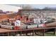 Model train display showcases detailed scenery with a refinery and passenger train at 14725 S 182Nd Dr, Goodyear, AZ 85338