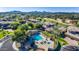Aerial view of community featuring a pool, spa, and well-maintained landscaping at 15240 N Clubgate Dr # 168, Scottsdale, AZ 85254