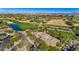 An aerial view of the community golf course, restaurant and lush landscaping at 15240 N Clubgate Dr # 168, Scottsdale, AZ 85254