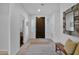 Bright foyer with tile flooring, stylish door, and a decorative mirror at 15240 N Clubgate Dr # 168, Scottsdale, AZ 85254