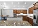 Well-equipped kitchen featuring granite countertops, stainless steel appliances, and ample cabinet space at 15240 N Clubgate Dr # 168, Scottsdale, AZ 85254
