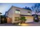 Charming two-story home with a two-car garage, well-maintained landscaping, and inviting curb appeal at 15550 N Frank Lloyd Wright N Blvd # 1040, Scottsdale, AZ 85260