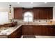 Well-appointed kitchen with granite countertops, stainless steel appliances, and decorative backsplash at 15550 N Frank Lloyd Wright N Blvd # 1040, Scottsdale, AZ 85260
