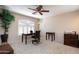 Bright office space with neutral walls, ceiling fan, and modern shutters at 15550 N Frank Lloyd Wright N Blvd # 1040, Scottsdale, AZ 85260